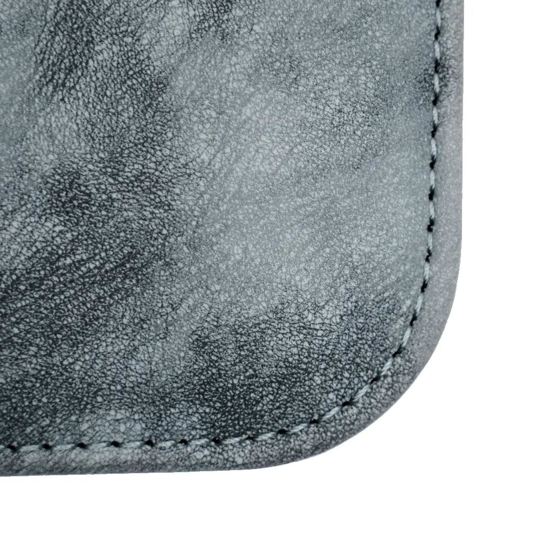 Detalj sivog Gemloader albuma za toploadere